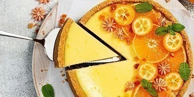 Cheesecake με κατσικίσιο τυρί chevre, παξιμάδι χαρουπιού, γλυκόξινα παντζάρια και κρέμα πορτοκάλι image